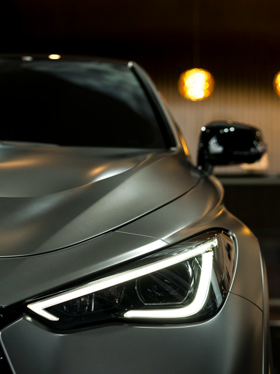 Ceramic car tinting Perth: detail of ceramic tinted glass on a dark vehicle